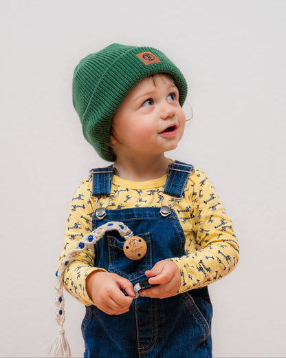 Ein cooles unisex fisherman Beanie in sattem Waldgrün. Mit einem coolen Fake-Leder-Patch mit Tagtraum Logo. Auch für Kinder und Kleinkinder geeignet. Kuschelig warme Bio-Baumwolle. Keine Wolle, krazt nicht, ultra bequem zu tragen. 100% natürlich.