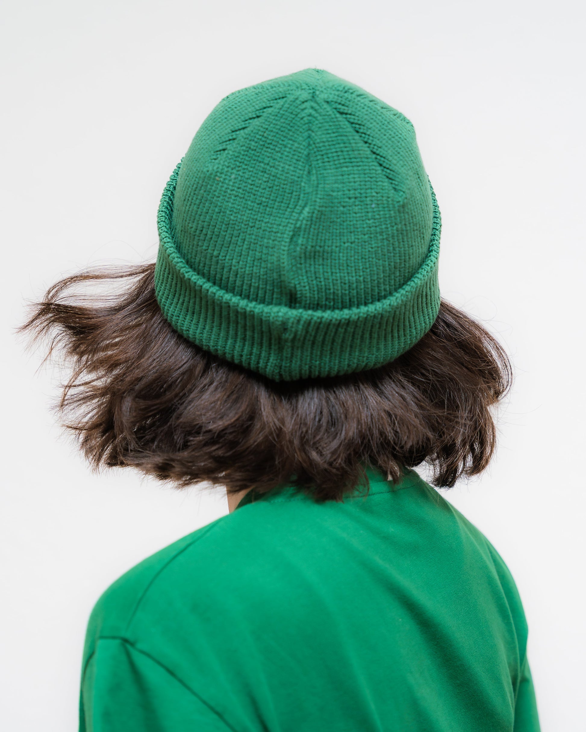 Ein cooles unisex fisherman Beanie in sattem Waldgrün. Mit einem coolen Fake-Leder-Patch mit Tagtraum Logo.