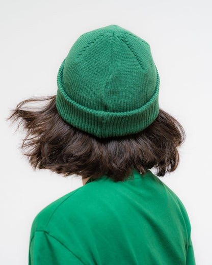 Ein cooles unisex fisherman Beanie in sattem Waldgrün. Mit einem coolen Fake-Leder-Patch mit Tagtraum Logo.