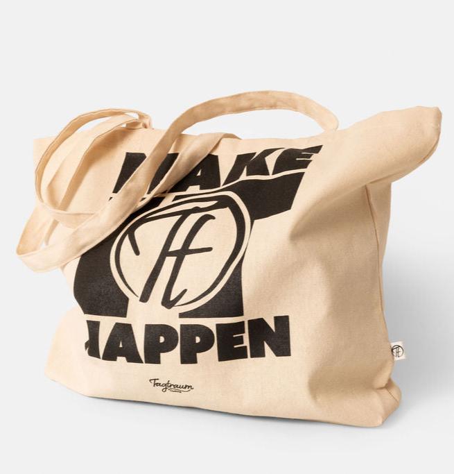 Ein Shopper aus Bio-Baumwolle, naturfarben, mit coolem, schwarzem "Make it happen" Print